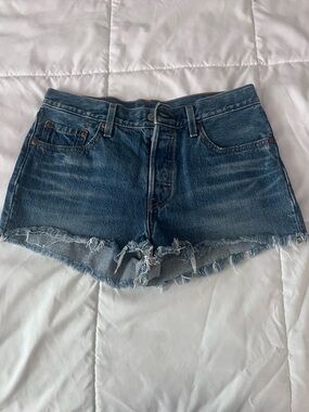 Levi's Distressed Dark Blue Denim Cutoff Shorts